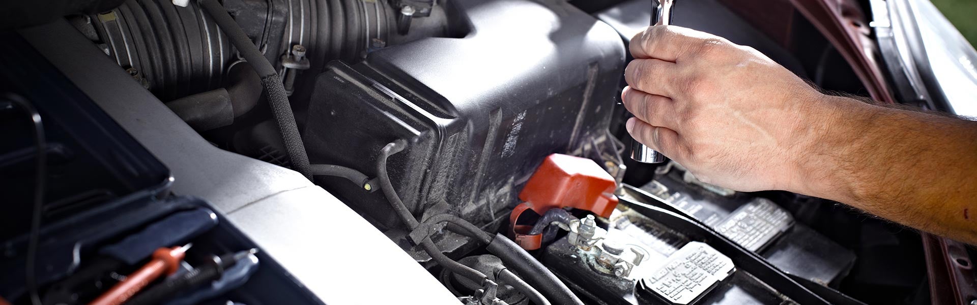 Mechanic replacing battery